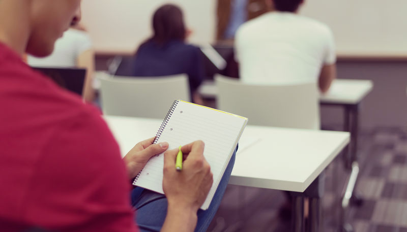 shutterstock_note taking in lecture