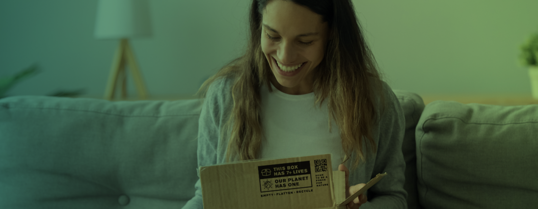 Women opening a box with the Box to Nature mark on it