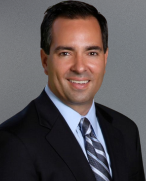 Santiago Arbelaez headshot on gray background