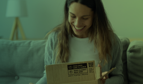 Women opening a box with the Box to Nature mark on it