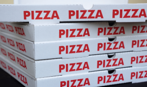 stacked pizza boxes