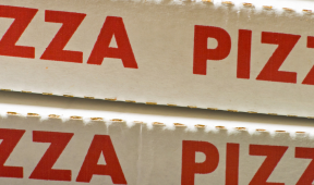 stack of pizza boxes