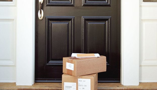 Cardboard boxes in front of door