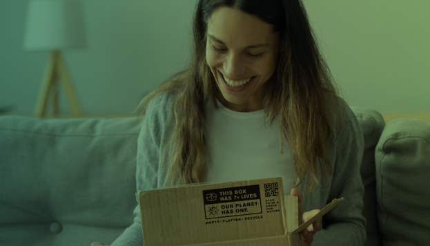 Women opening a box with the Box to Nature mark on it