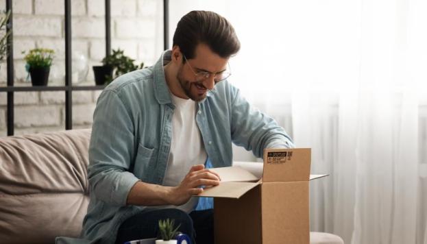 Man opening a box