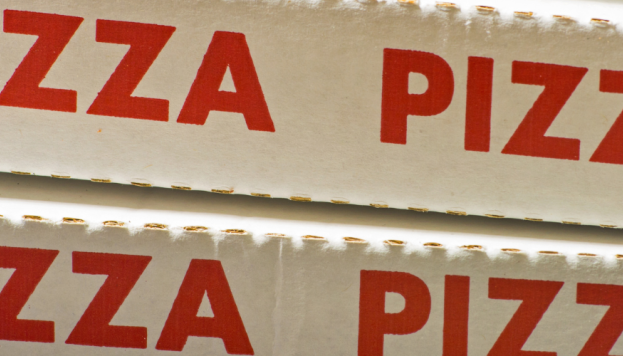stack of pizza boxes
