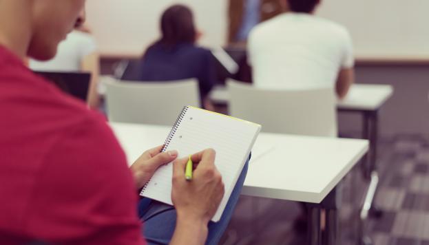 shutterstock_note taking in lecture