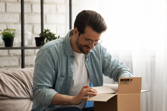Man unboxing his package